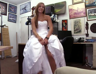 Teenager bride in a wedding dress. This tailor has gigantic
