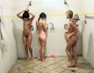 Bare teenage femmes lather each other in the bathroom after