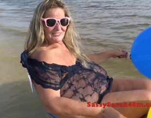 Ginormous saggy fun bags wifey juggling at the beach